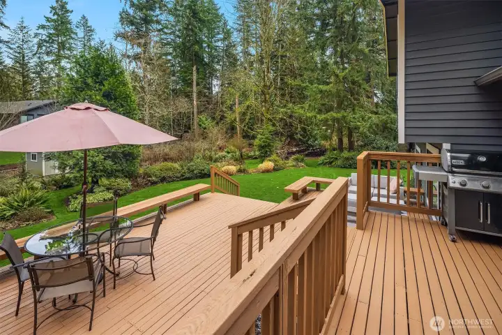 Multi-level entertainer's deck with built-in seating.