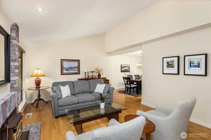 Host friends in the vaulted living area & adjacent dining room.