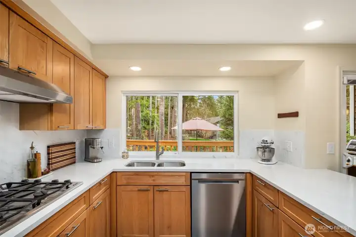Treat the chef to sleek quartz surfaces & serene views.
