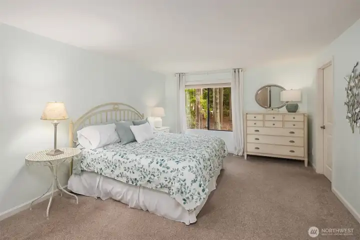 Your primary suite awaits you on the upper level.