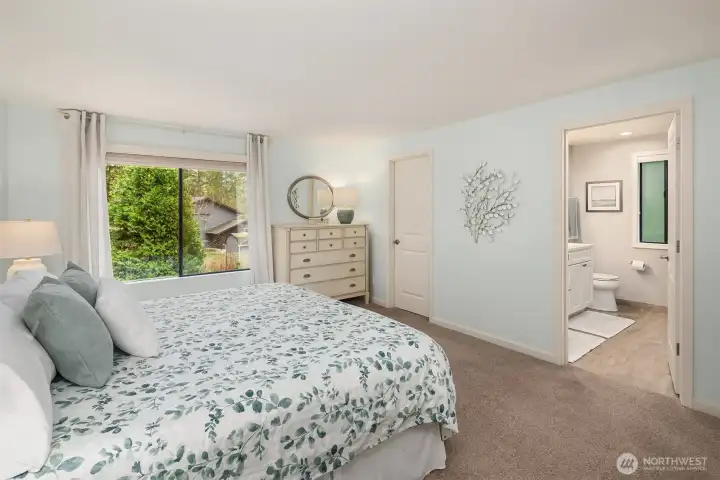 Serene views, walk-in closet, & en-suite bath!