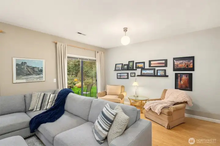 A slider opens to the patio & huge back yard.