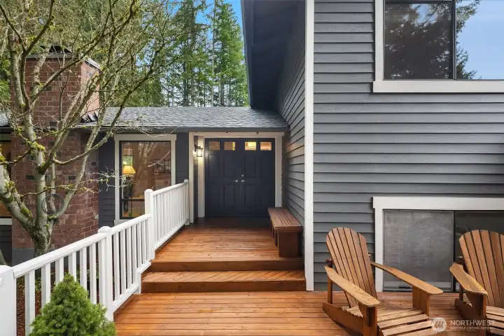 A lovely front deck & double-door entry welcome you home.