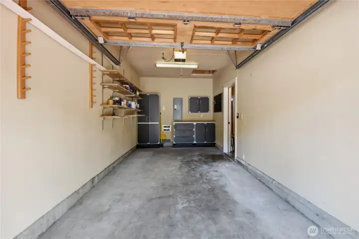 One car garage with workspace. Attic above with additional storage space.