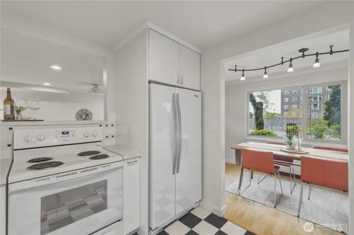The dining area connects effortlessly to the updated kitchen and living room, creating a comfortable layout for everyday living and hosting guests.