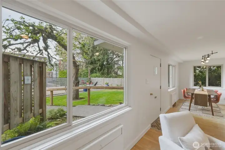 Enjoy extra windows and serene outlooks from this desirable corner location, bringing in light and showcasing the beautifully landscaped grounds.