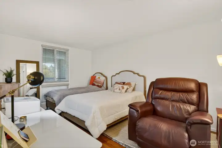 Roomy Primary Suite with updated flooring & blinds. Walk-in closet PLUS extra large closet.