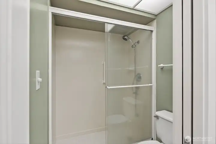 Step in tile shower.