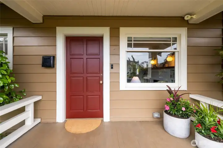 Enjoy the covered front patio in all weather.