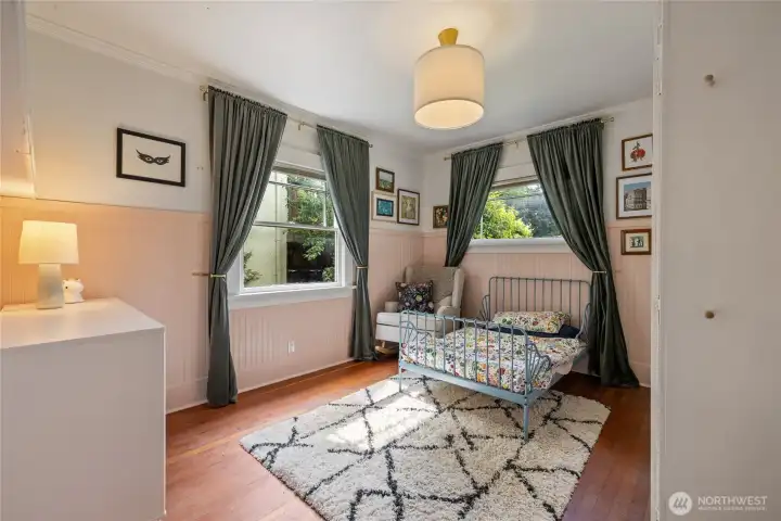 Bedroom #2 is the larger of the main floor bedrooms. It offers beautiful morning and midday light.