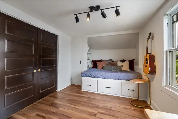 Pocket doors (and a non load bearing wall) completes the charm of this space.