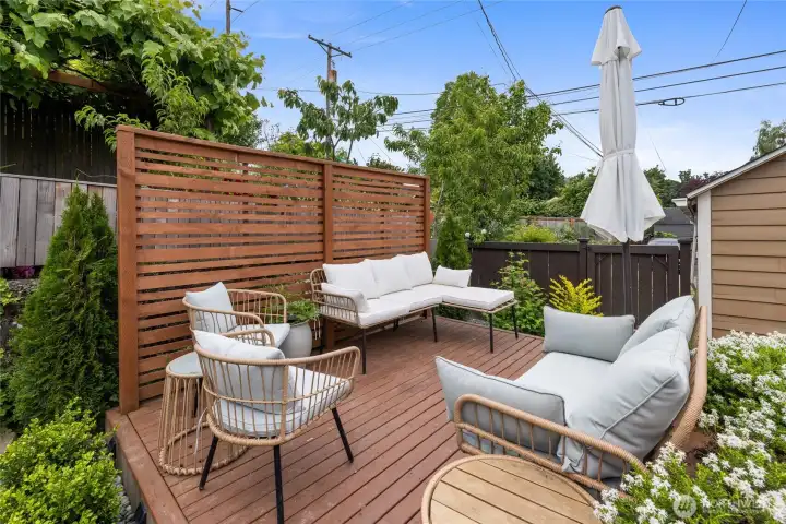 This cedar deck was built in 2023 and really extends the outdoor living space gracefully.