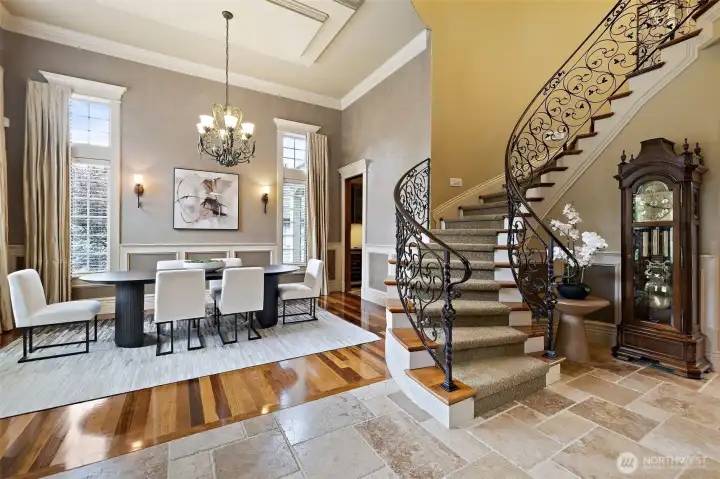 Travertine, Brazilian hardwood floors, custom wrought iron staircase, rich crown molding, boxed ceilings.....the attention to detail in this home is a must see! Travertine, Brazilian hardwood floors, custom wrought iron staircase, rich crown molding, boxed ceilings.....the attention to detail in this home is a must see!