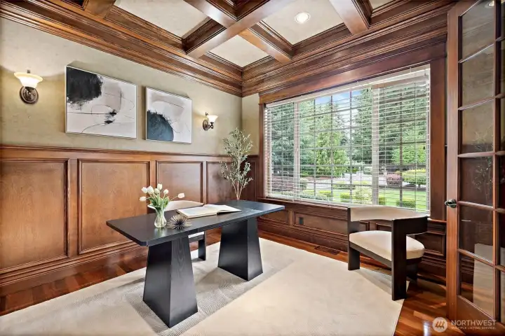 custom built in shelving, beautiful, boxed ceilings and raised wainscoting overlooking the front yard. custom built in shelving, beautiful, boxed ceilings and raised wainscoting overlooking the front yard.