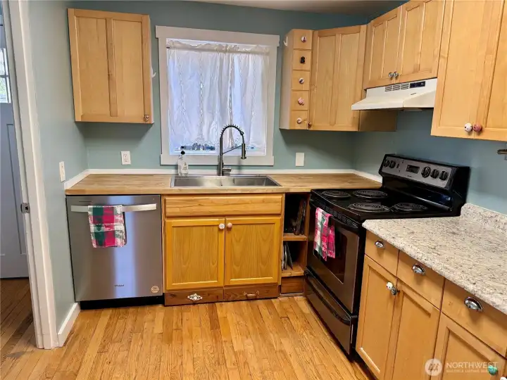 Another view of the kitchen and the beautiful cabinets!