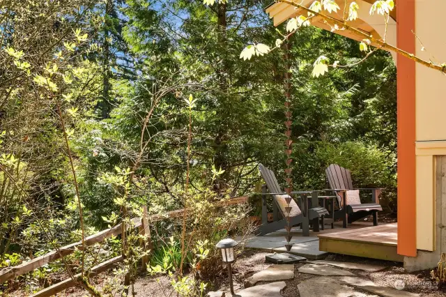 The large daylight lower level opens to a private patio to soak up and enjoy the woodland garden beauty.