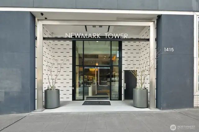 Welcome to the Newmark. Just one block to Pike Place Market.  Concrete and steel building.  24 hr concierge service, pool, spa, sauna, gym, and business center.