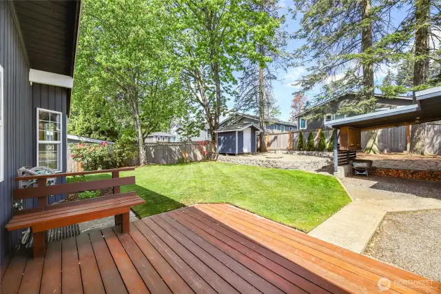 Cement walkways  Wood deck with built in seat