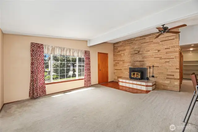 LIVING ROOM   Vaulted ceilings  Ceiling fan / Hardwood floors under carpet  Large picture window