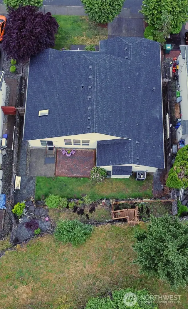 Drone view of new roof and back yard
