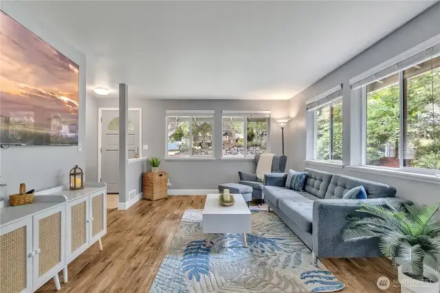Light and bright living room with custom 2 inch blinds.