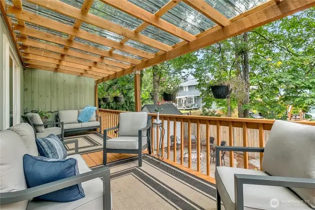 Spacious covered deck is located off of the family room for year-round enjoyment.