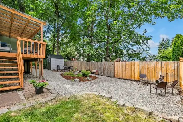 This is a view of the backyard. Plenty of room for all sorts of gatherings and yard games.