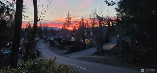 Beautiful sunrise view of SE 271st Street from in front of the home.