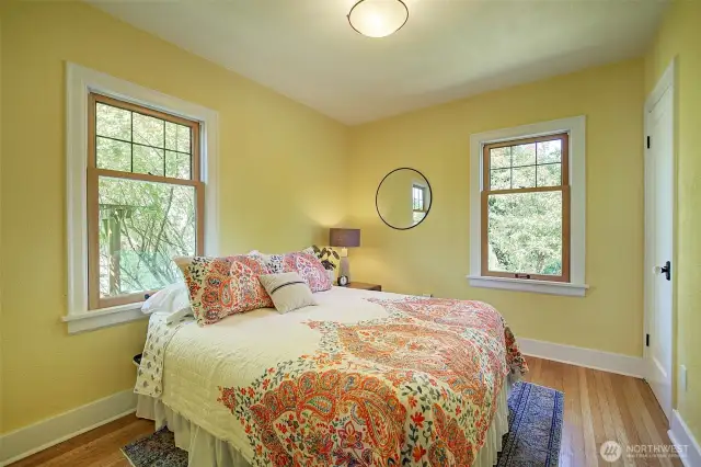 1 of 2 bedrooms on the main floor. Queen bed is pictured here but would fit a King.