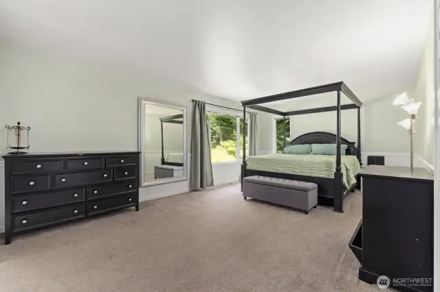 Primary suite has plenty of space in the bedroom.