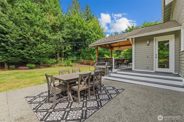 There is both deck space and this patio which is great for summer BBQs.