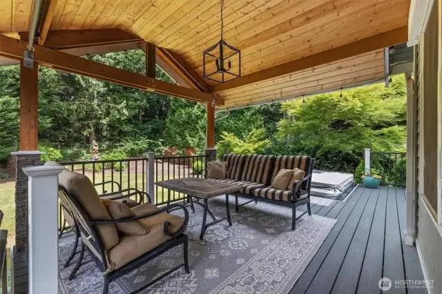 Covered back deck is great for enjoying the outdoors year-round.