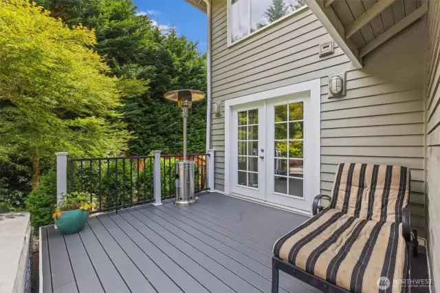 Additional deck space off the French doors from the family room.