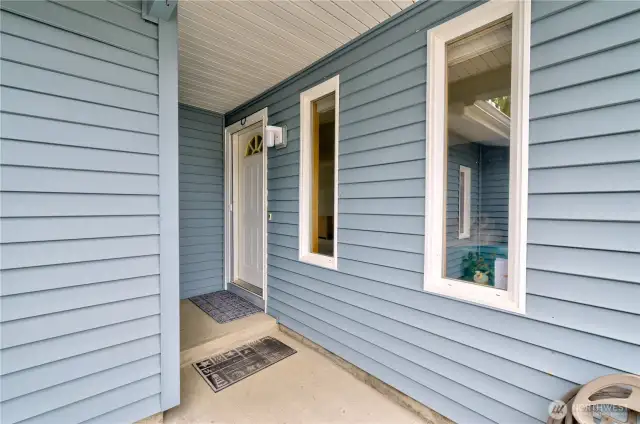 East facing covered entry keeps you and your guests out of the elements.