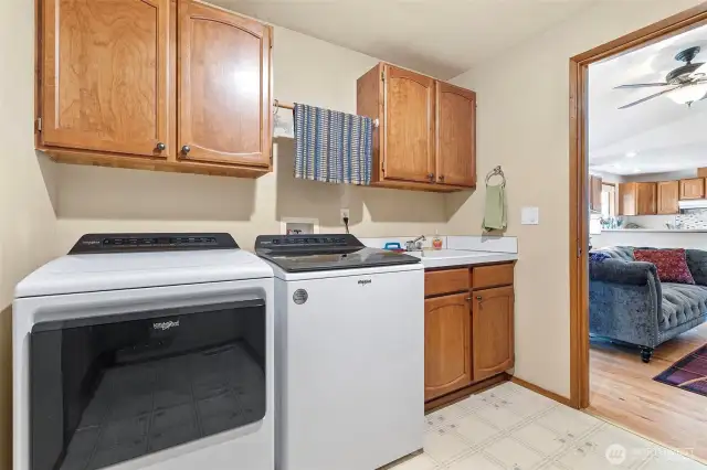 The laundry room off of the family room that takes you to the garage and the heated workshop.