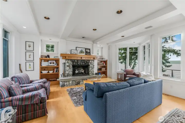Cozy up by the fire in the main living room.