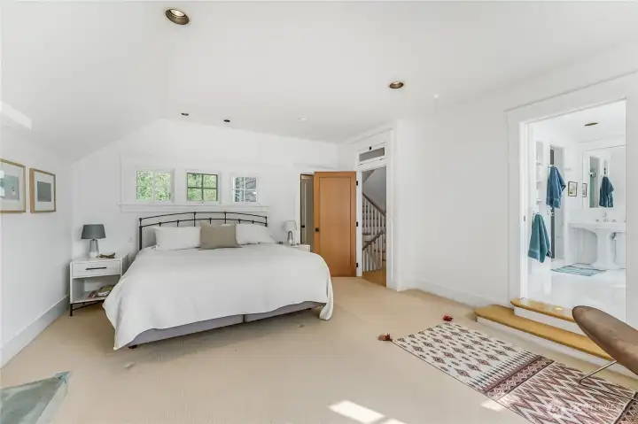 The primary bedroom is complete with Juliet balcony, walk-in closet, 5 piece ensuite and gas fireplace.