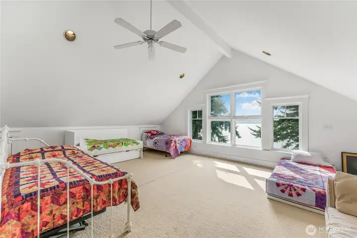 The large loft has sweeping views and is a great flex space for a hobby room, office, or whatever you need!