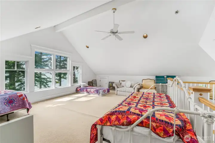 The large loft has sweeping views and is a great flex space for a hobby room, office, or whatever you need!
