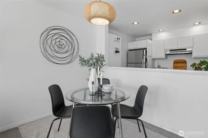 Cute dining area with new lighting.