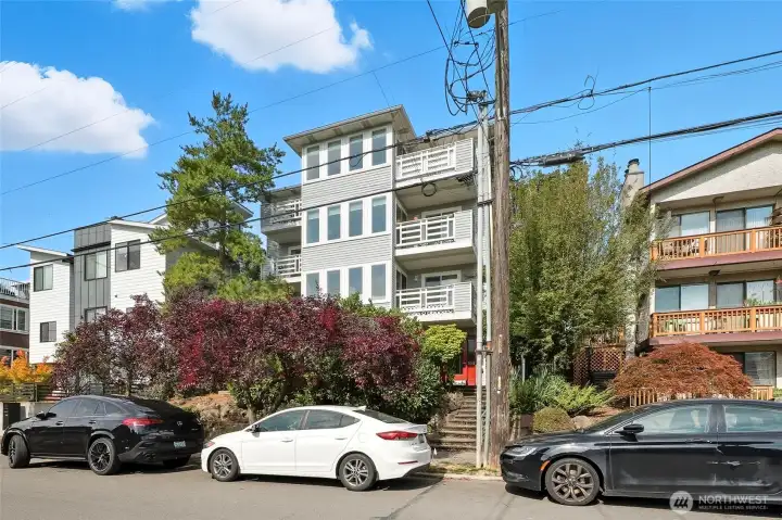 This boutique condo sits on a wide street centrally located to all things Ballard!