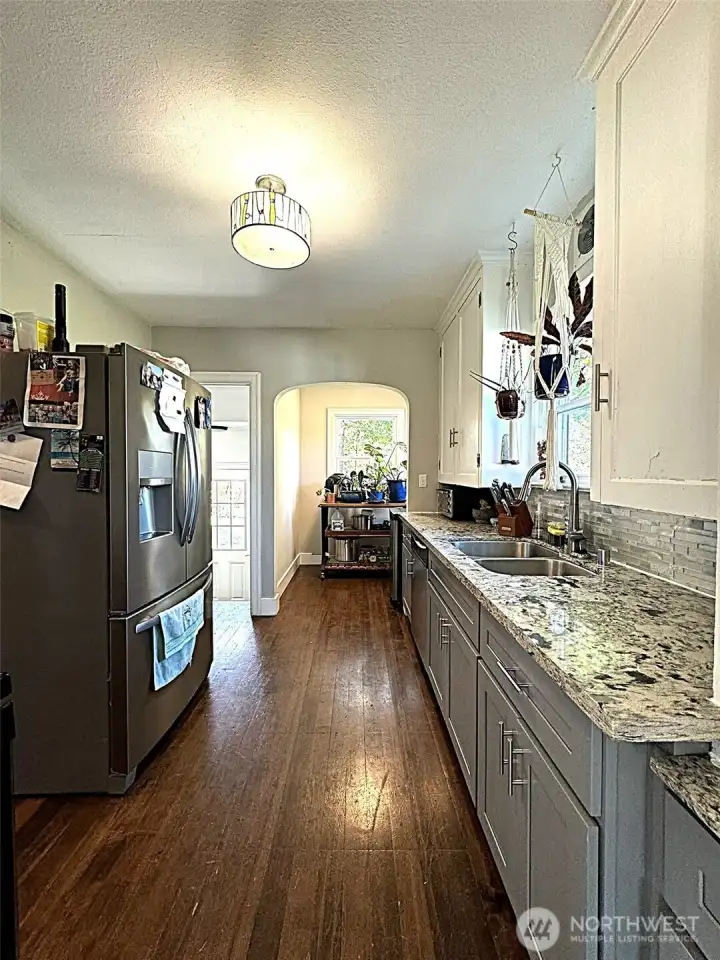 Showing eating nook in kitchen. This area offers a cozy spot for meals and casual gatherings within the kitchen space.
