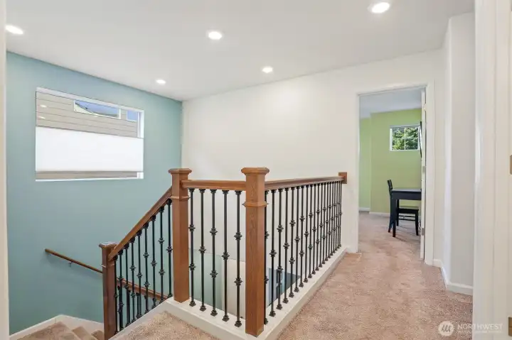 Upstairs 2nd floor open staircase landing.