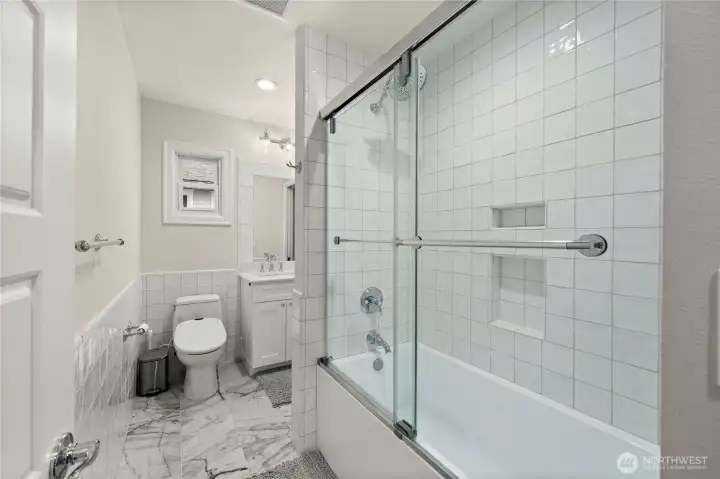 Main level bathroom connected to bedroom