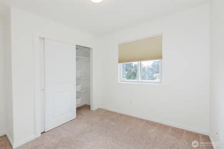 Bedroom #3. Custom closet shelving.
