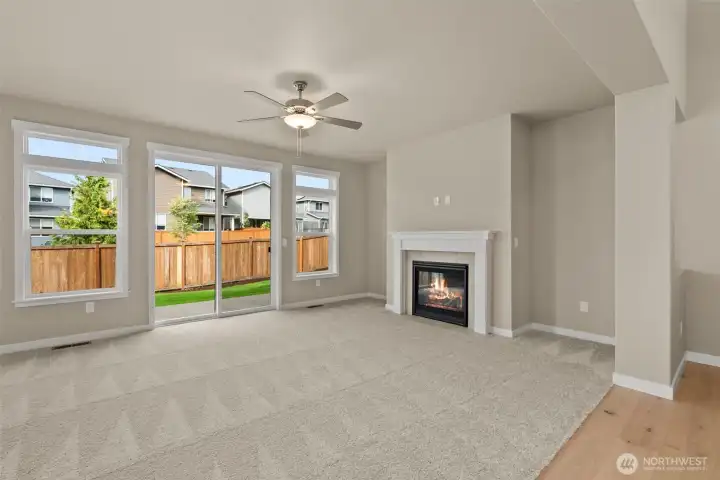 Sliding door off the living room leading to backyard patio.