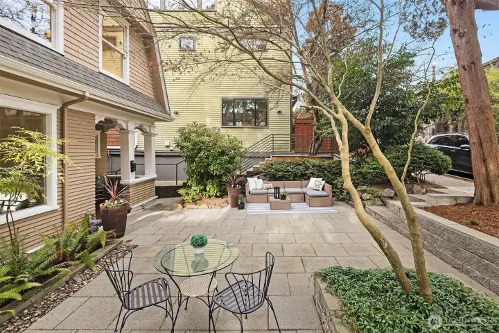 A quiet patio with room for seating, eating and relaxing. This street offers privacy and very few drivers.