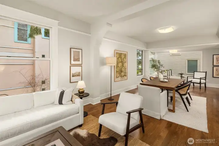 A perfect floorplan with the living room flowing into the oversized dining room and a sitting area next to the large kitchen