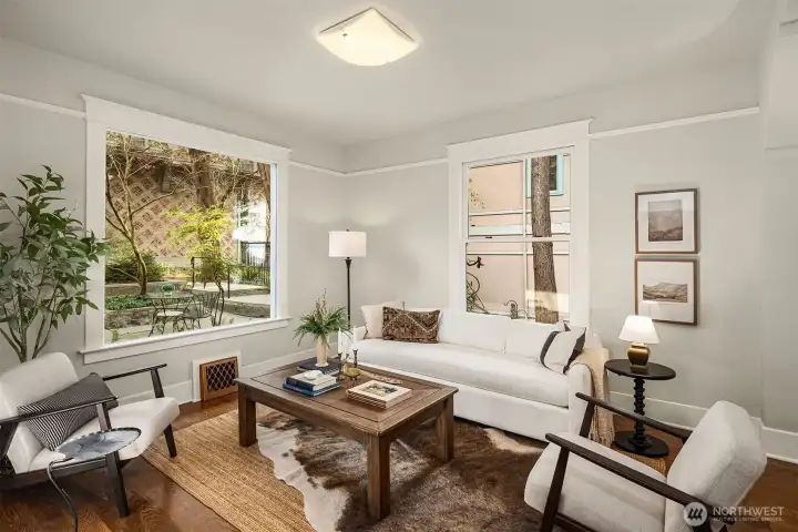 Looking out to the peaceful patio- huge windows throughout letting in light all day!