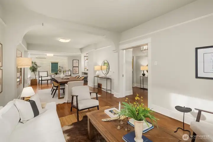 High ceilings throughout- another perpective towards the entry and another entrance to the kitchen